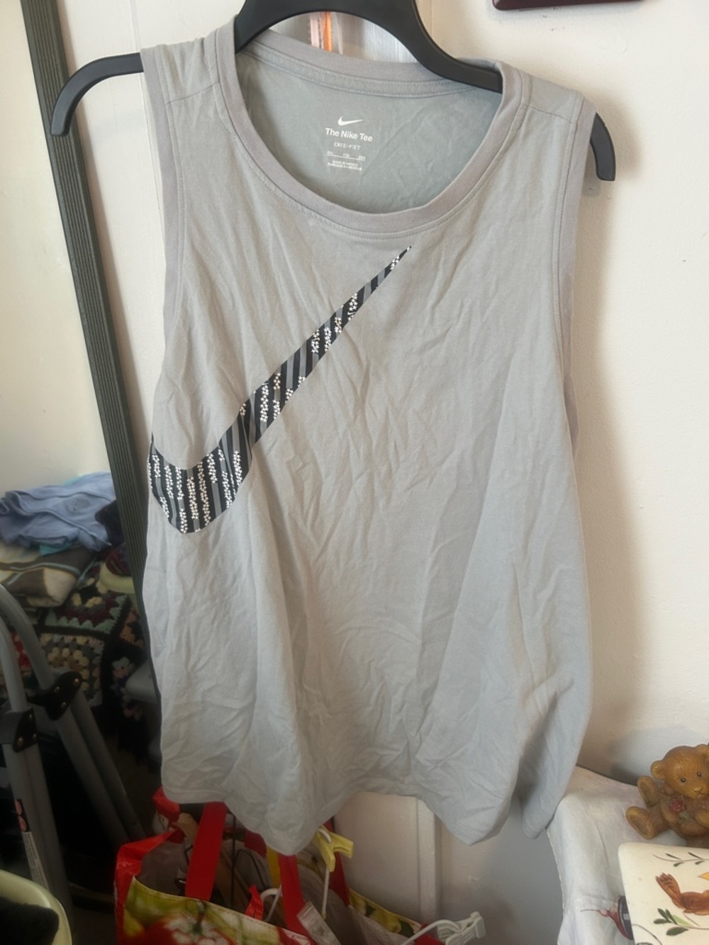 Nike Women’s Light Gray Sleeveless Training Tank with Black Patterned Swoosh